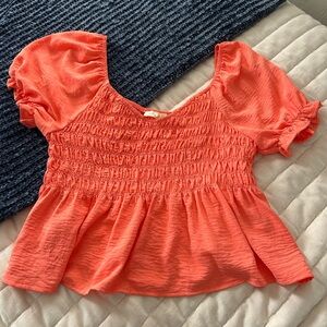 Cute coral-colored top